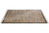 Angled view of Indian Folk Art rug, showing pictorial beige, slate blue, and olive green landscape.