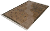 Close-up of folk art rug with abrashes, shallow carved contour, and slate blue animals.