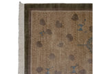 Cream fringe and olive borders of folk art rug with carved slate blue figures.