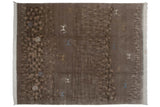 Indian Folk Art rug's right corner: carved pebbled pattern, blue antelope, ivory fringe.