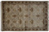 Arts and Crafts border with brown vinery, beige field, and sage floral palmettes.