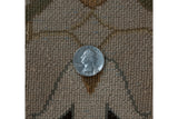 Full hand-knotted pile of William Morris design carpet, beige, brown, and powder blue. Quarter for scale.