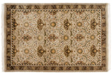 Bottom right corner of William Morris rug with germinating plants, floral palmettes, brown borders.