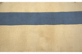 Art Deco carpet's shallow carved pile, showing ivory and pale denim blue.