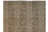 Hand woven Soumac carpet with ivory, beige abrashes, geometric triangles, and Rococo vines.