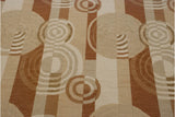 Abstract pattern of ivory, beige, and copper rectilinear blocks with ripple circles.