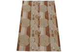 Abstract Indian Soumac carpet section with ivory, beige, and copper rectilinear blocks and ripple circles.
