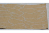 Abstract vinery pattern on sunflower yellow and ivory Soumac rug, side selvage.
