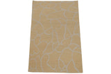 Upper right corner of hand woven Soumac rug, with abstract ivory vinery on yellow.