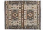 Southwestern geometric Indian Soumac rug, bold patterns in charcoal, ivory, and tan.