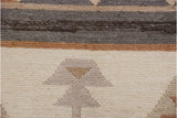 Southwestern hand-woven Soumac detail with geometric finned motif and neutral striped texture.