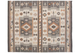 Right side detail of ivory, gray, brown Southwestern Soumac rug geometric patterns.