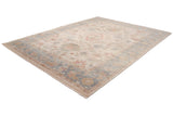 A corner-angled view of a Sultanabad carpet showing its full pattern and soft color palette.