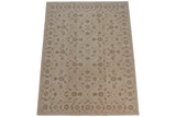 Indian Soumac design rug with Rococo stylized floral arabesques in ivory and pale coffee brown.