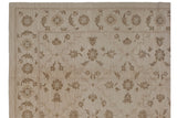Ivory and pale coffee brown Rococo stylized floral arabesques and scrolling tendrils.