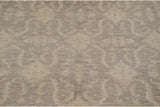 Tone on tone pattern of subtle shield medallions in silver and ivory on a Peshawar carpet.