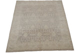 Peshawar carpet corner with tone-on-tone ivory and silver shield medallions and ribboned leaves.