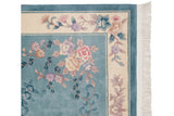 Vintage Chinese Art Deco carpet corner, carved pastel floral bouquets, sky blue, ivory fringe.