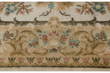 Ornate Savonnerie border with Rococo scrolling leaves and blossoms in ivory, beige, blush.