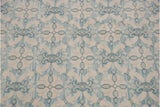 Contemporary Indian Soumac design rug with ivory piled quatrefoil motifs on a flat blue ground.