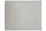 Indian Soumac carpet detail: pale blue, ivory three-dimensional roundel medallion pattern.