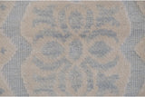 Pale powder blue and ivory Soumac weave, revealing low pile and three-dimensional effect.