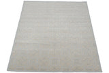 Textured pale powder blue and ivory roundel medallions on an Indian Soumac design carpet.