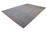 Modern Indian Persian rug, angled with distressed beige and blue abrash.