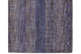 Modern Indian carpet showing speckled blue and ivory seeded pattern and silk accents.