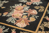 Detailed view of rose and copper floral bouquets showing the hand-woven chainstitch texture.