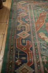 Vintage Indian Caucasian rug border, dusty denim blue, terracotta, and pink geometric motifs.