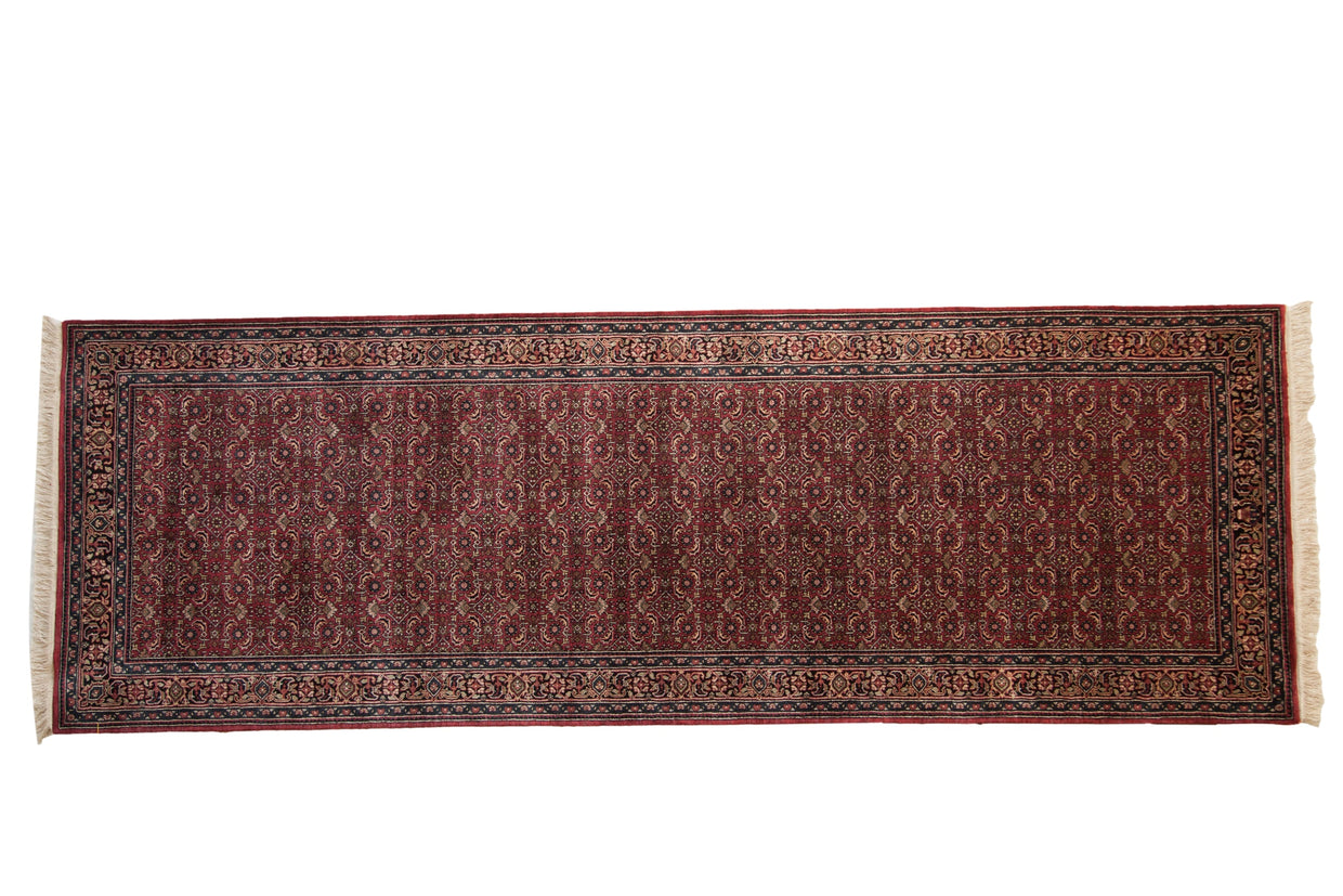 Fine Indian Bijar runner featuring dark cochineal red allover Herati mahi-mahi and navy borders, 4'1