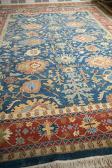 Vintage Indian Bijar design carpet: blue field's floral arabesques and multi-layered borders.