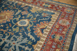Vintage Indian Bijar rug corner: sky blue field, floral arabesques, cream and red borders.