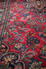 Vintage Dargezine runner with full pile, cherry red field, and vibrant floral bouquets.