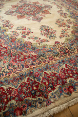 Ornate red and blue floral border and fringe of the Vintage Persian Kazvin carpet.