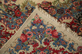 Intact beige selvage and cream fringe showcasing a vibrant floral Kazvin pattern.