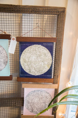 Lower section of the navy and ivory moon chart with walnut wood rod.