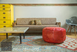 Limited edition Mod Square Table styled as a coffee table in an eclectic, colorful living space.