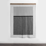 Geometric gray and black color block quilted cotton design.