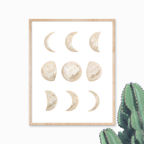 Moon Phases watercolor art print with cream and white phases, light wood frame, 11x14.