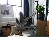 Made in USA Butterfly Chair with black and white African mudcloth geometric pattern and gold-tone frame.