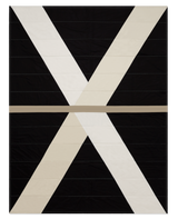 Modern geometric quilt by Louise Gray, highlighting sharp black, white, and tan sections with visible quilting.