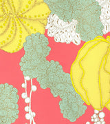 Detail of whimsical succulent art poster with yellow, teal, and gold on pink.