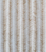 Grey Fishbone Retro Wallpaper close-up, metallic gold pattern on light blue-grey.