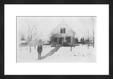 Black and white framed antique photograph of a surreal snowy house scene.