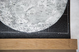 Intricate moon surface details on black canvas with bottom 'NORTH' label and walnut rod.