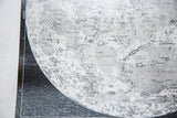 Close-up of the moon chart's intricate lunar details, labeled seas, and canvas texture.