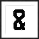 Black framed photograph of a stark distressed ampersand symbol.