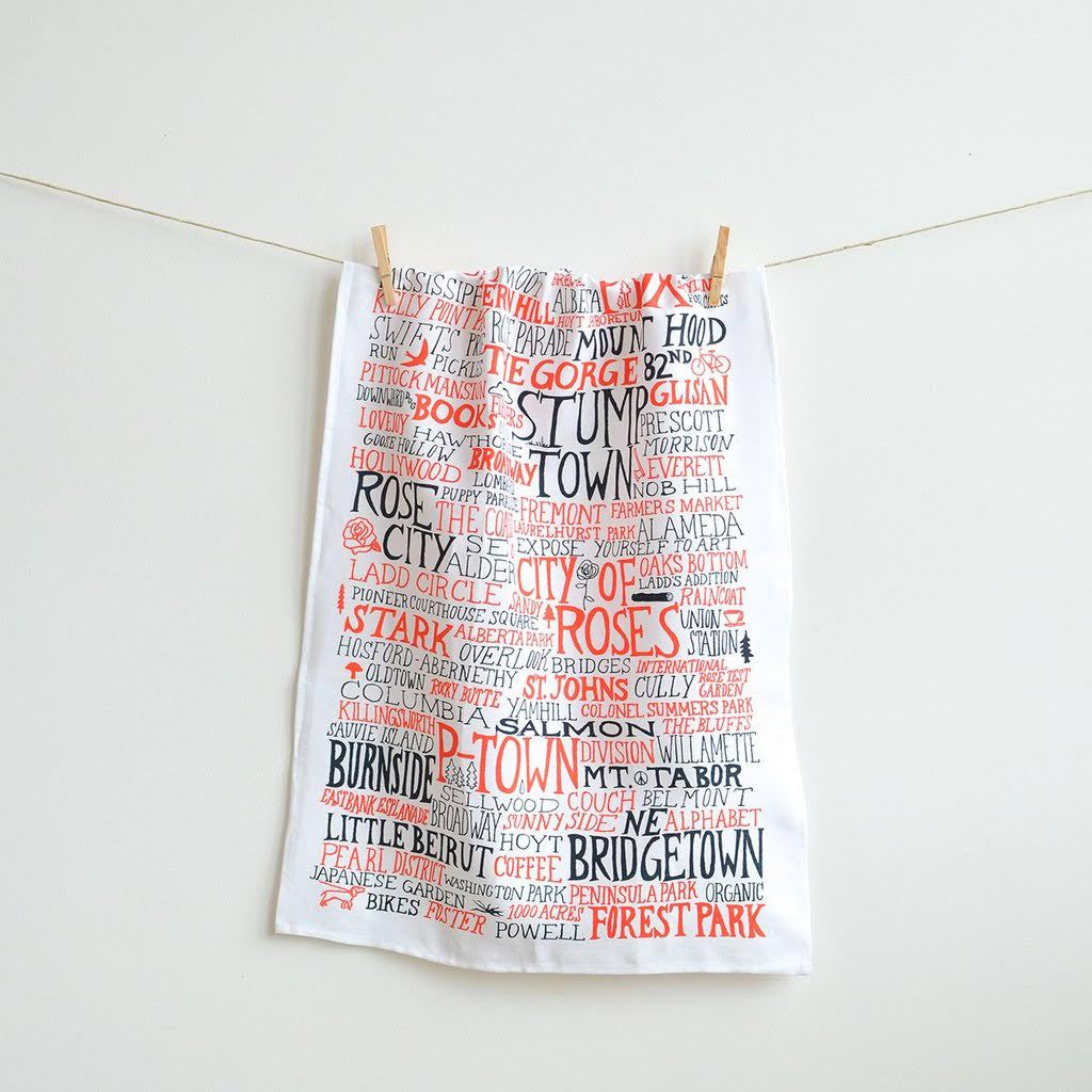 Portland, OR - PDX Graphic Tea Towel with white, red, and black screen-printed text, 20x28.